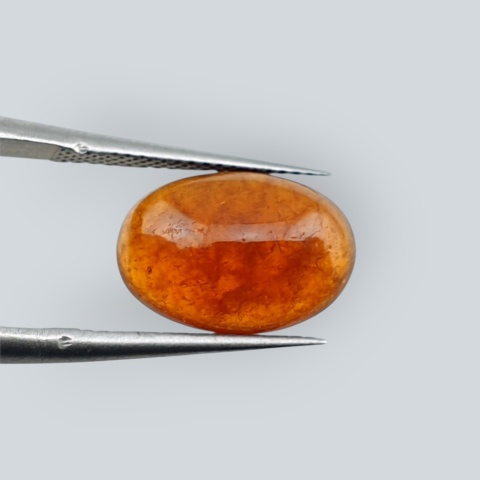 Hessonite garnet cabochon 12x9 mm no 102