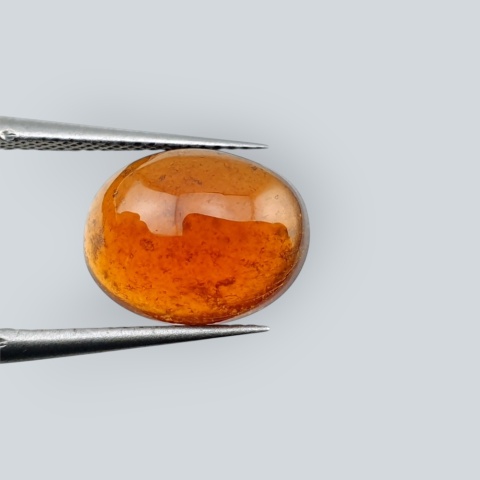 Hessonite garnet cabochon 12x9 mm no 123
