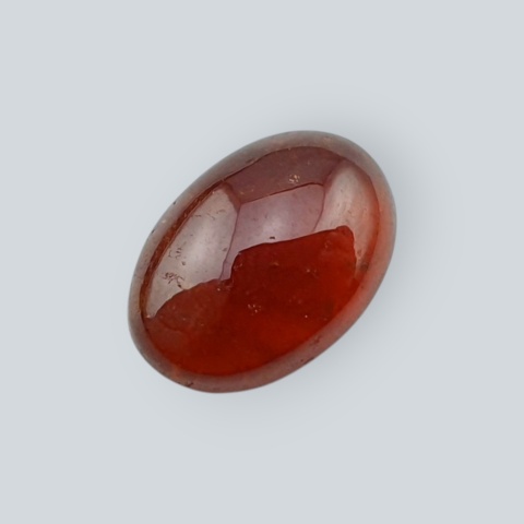 Hessonite garnet cabochon 12x9 mm no 148
