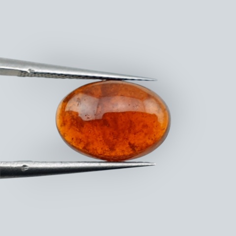 Hessonite garnet cabochon 12x9 mm no 148