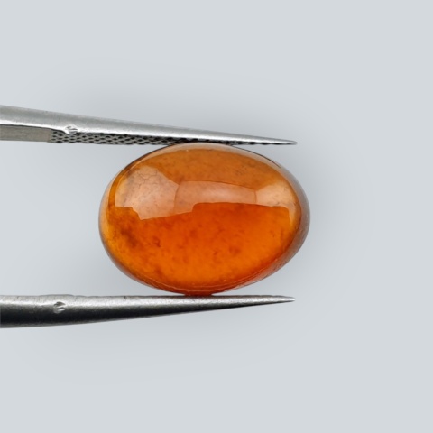 Hessonite garnet cabochon 12x9 mm no 161