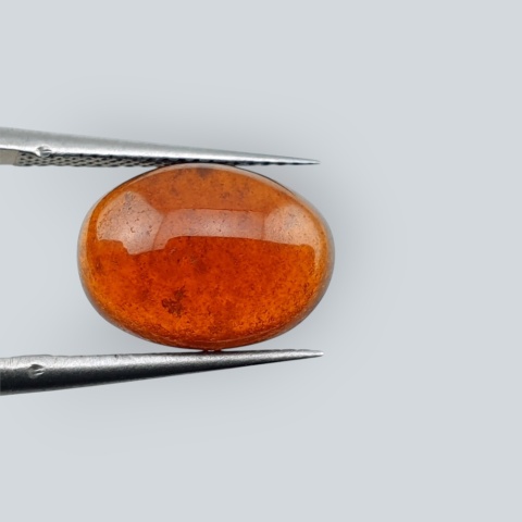 Hessonite garnet cabochon 12x9 mm no 177