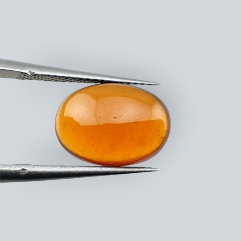 Hessonite garnet cabochon 12x9 mm no 206