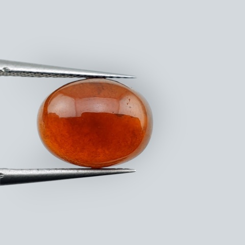 Hessonite garnet cabochon 12x9 mm no 215