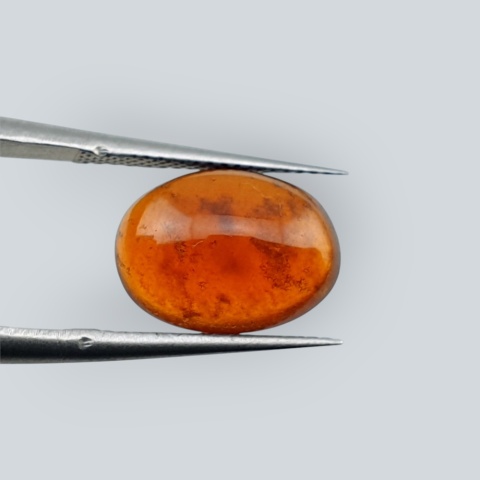 Hessonite garnet cabochon 12x9 mm no 216