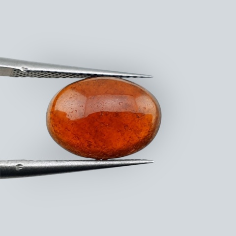 Hessonite garnet cabochon 12x9 mm no 218
