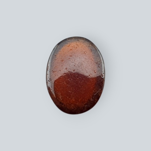 Hessonite garnet cabochon 12x9 mm no 218