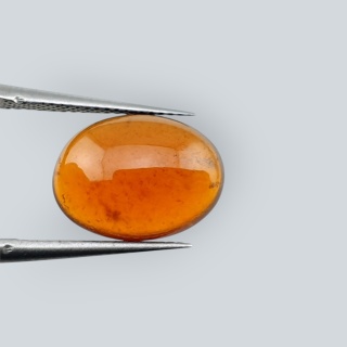 Granat Hessonit kaboszon 13x10 mm nr 122