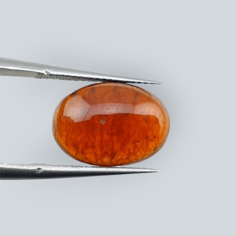 Hessonite garnet cabochon 13x10 mm no 143