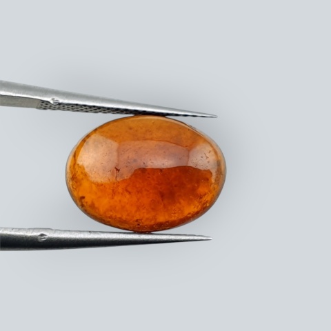 Hessonite garnet cabochon 13x10 mm no 156