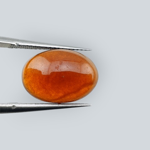 Hessonite garnet cabochon 13x9 mm no 222
