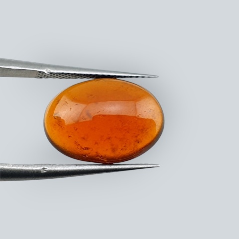 Hessonite garnet cabochon 14x11 mm no 130