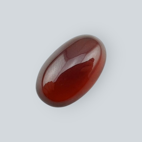 Hessonite garnet cabochon 14x8 mm no 180