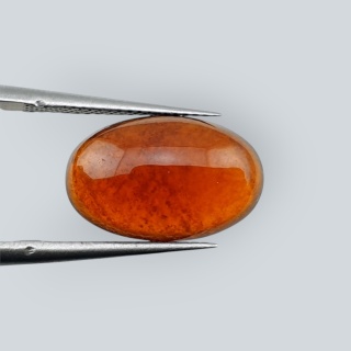 Granat Hessonit kaboszon 14x9 mm nr 64