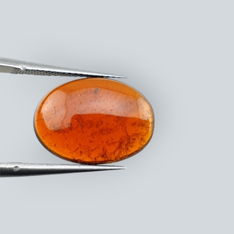 Hessonite garnet cabochon 15x11 mm no 84