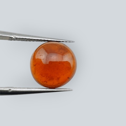 Hessonite garnet cabochon fi 10 mm no 154