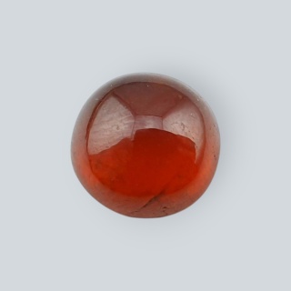 Granat Hessonit kaboszon fi 10 mm nr 62