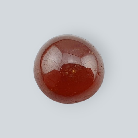 Hessonite garnet cabochon fi 10 mm no 77