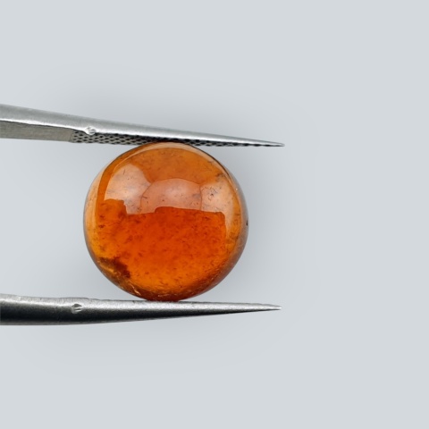 Hessonite garnet cabochon fi 11 mm no 173