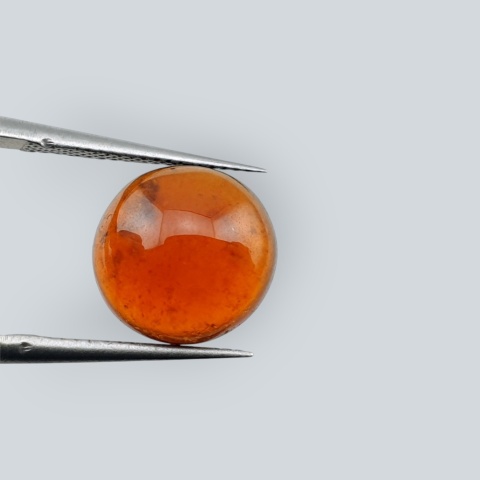Hessonite garnet cabochon fi 11 mm no 211