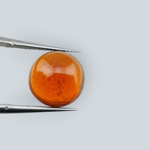 Hessonite garnet cabochon fi 11 mm no 63