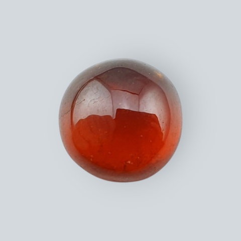 Hessonite garnet cabochon fi 11 mm no 73