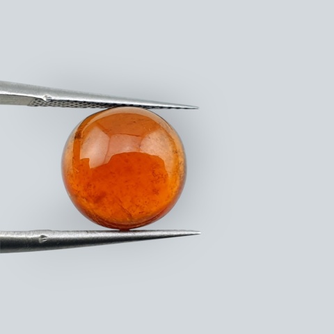 Hessonite garnet cabochon fi 11 mm no 73