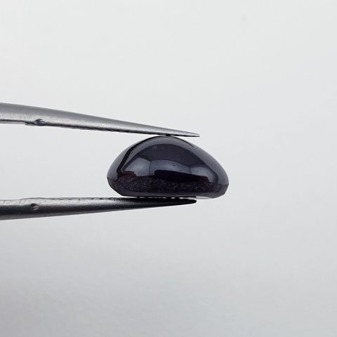 Granat gwiaździsty kaboszon 10x8 mm nr 186