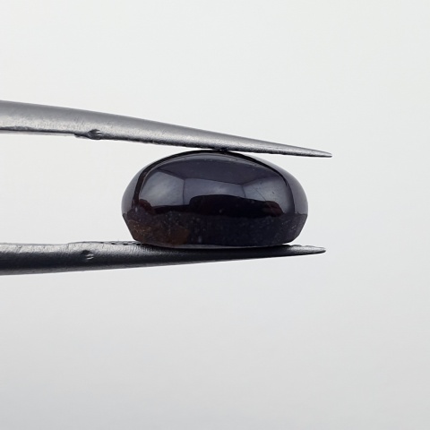 Granat gwiaździsty kaboszon 10x8 mm nr 310