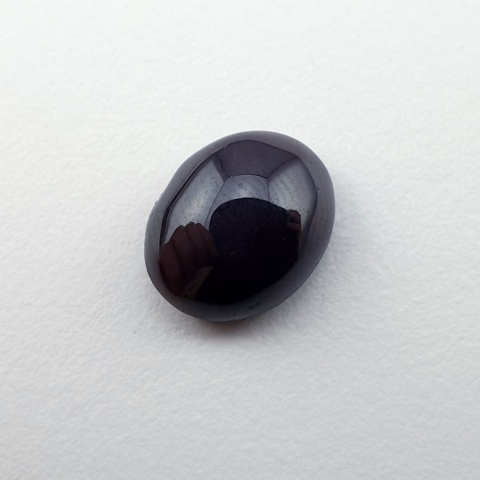 Granat gwiaździsty kaboszon 10x8 mm nr 334