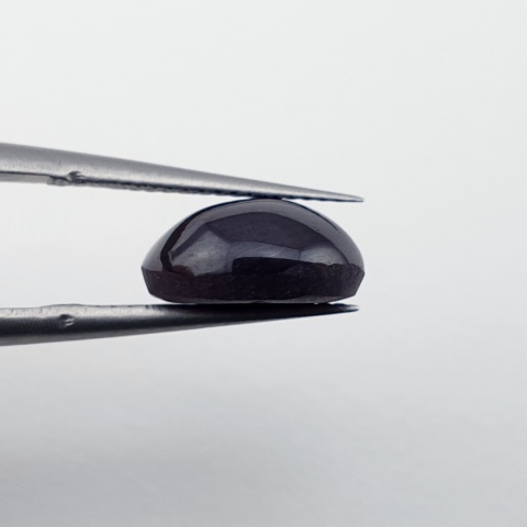 Granat gwiaździsty kaboszon 10x8 mm nr 334