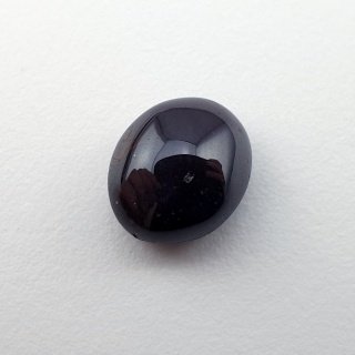 Granat gwiaździsty kaboszon 10x9 mm nr 327