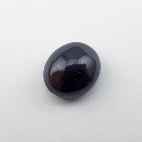 Granat gwiaździsty kaboszon 11x10 mm nr 142