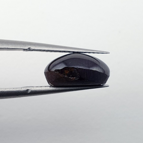 Granat gwiaździsty kaboszon 11x8 mm nr 292