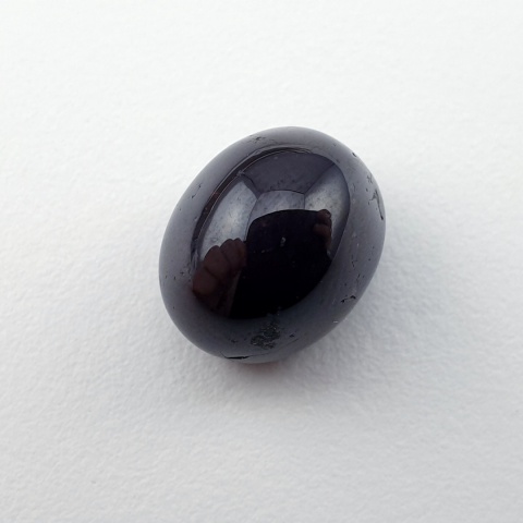 Granat gwiaździsty kaboszon 11x9 mm nr 145