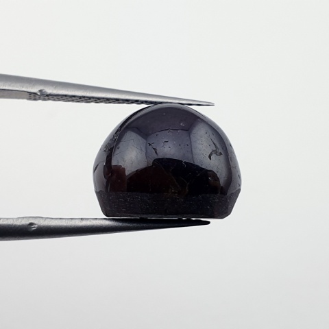 Granat gwiaździsty kaboszon 11x9 mm nr 145