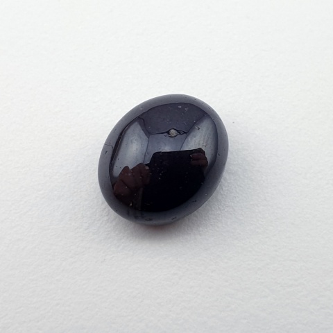 Granat gwiaździsty kaboszon 11x9 mm nr 192