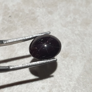 Granat gwiaździsty kaboszon 11x9 mm nr 255