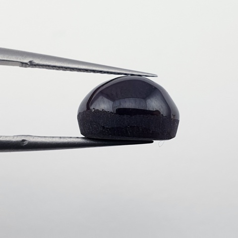 Granat gwiaździsty kaboszon 11x9 mm nr 258