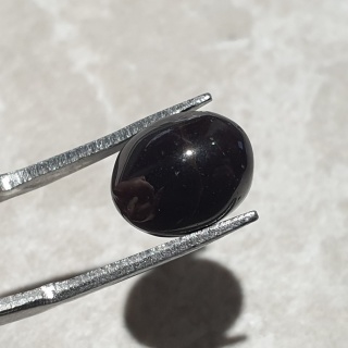 Granat gwiaździsty kaboszon 11x9 mm nr 291