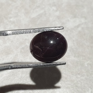 Granat gwiaździsty kaboszon 11x9 mm nr 298