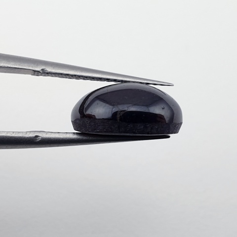 Granat gwiaździsty kaboszon 11x9 mm nr 298