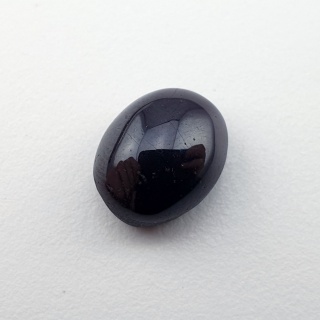 Granat gwiaździsty kaboszon 11x9 mm nr 300