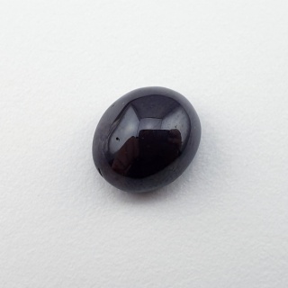 Granat gwiaździsty kaboszon 11x9 mm nr 305