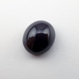 Granat gwiaździsty kaboszon 11x9 mm nr 316