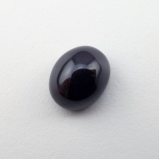 Granat gwiaździsty kaboszon 11x9 mm nr 317