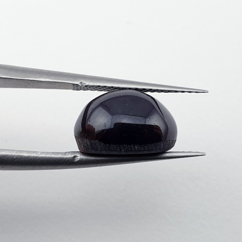 Granat gwiaździsty kaboszon 11x9 mm nr 317