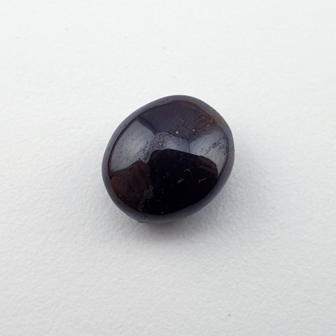 Granat gwiaździsty kaboszon 11x9 mm nr 319