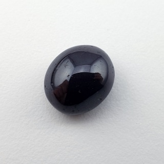 Granat gwiaździsty kaboszon 11x9 mm nr 321