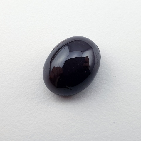 Granat gwiaździsty kaboszon 11x9 mm nr 322